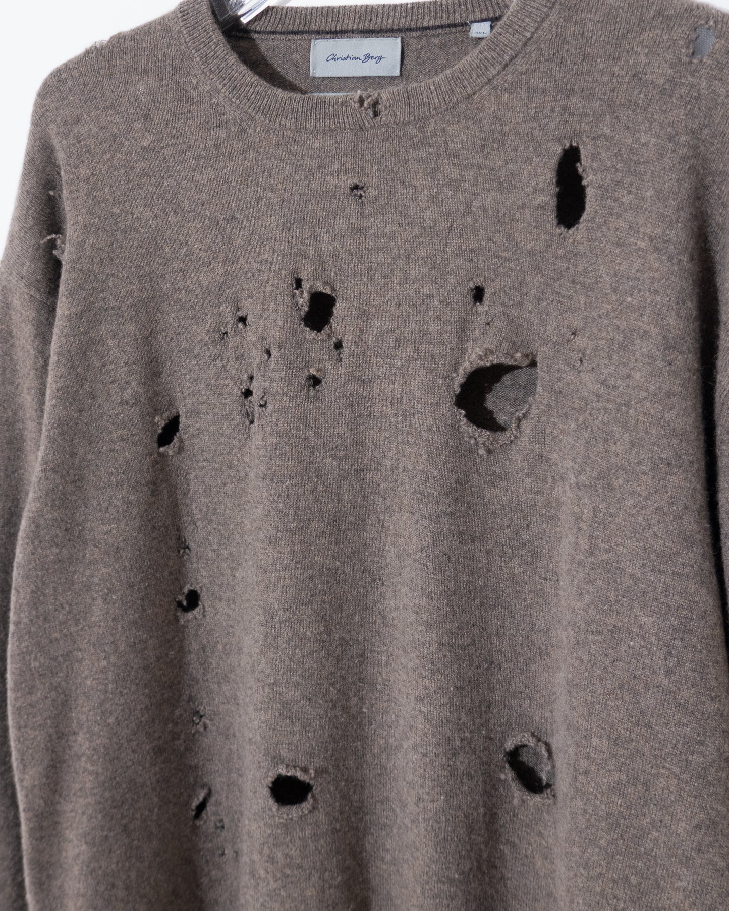 Damaged cashmere knit