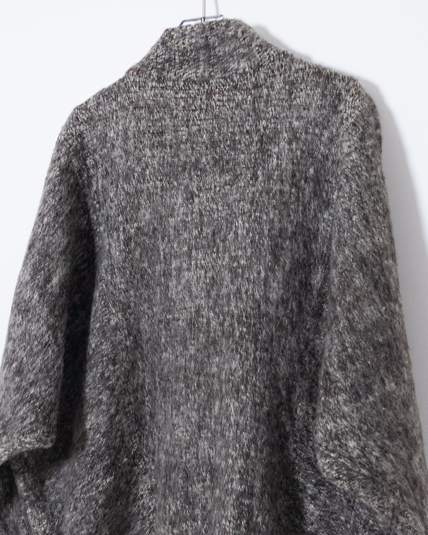 Dolman sleeve panel switch wool knit blouson