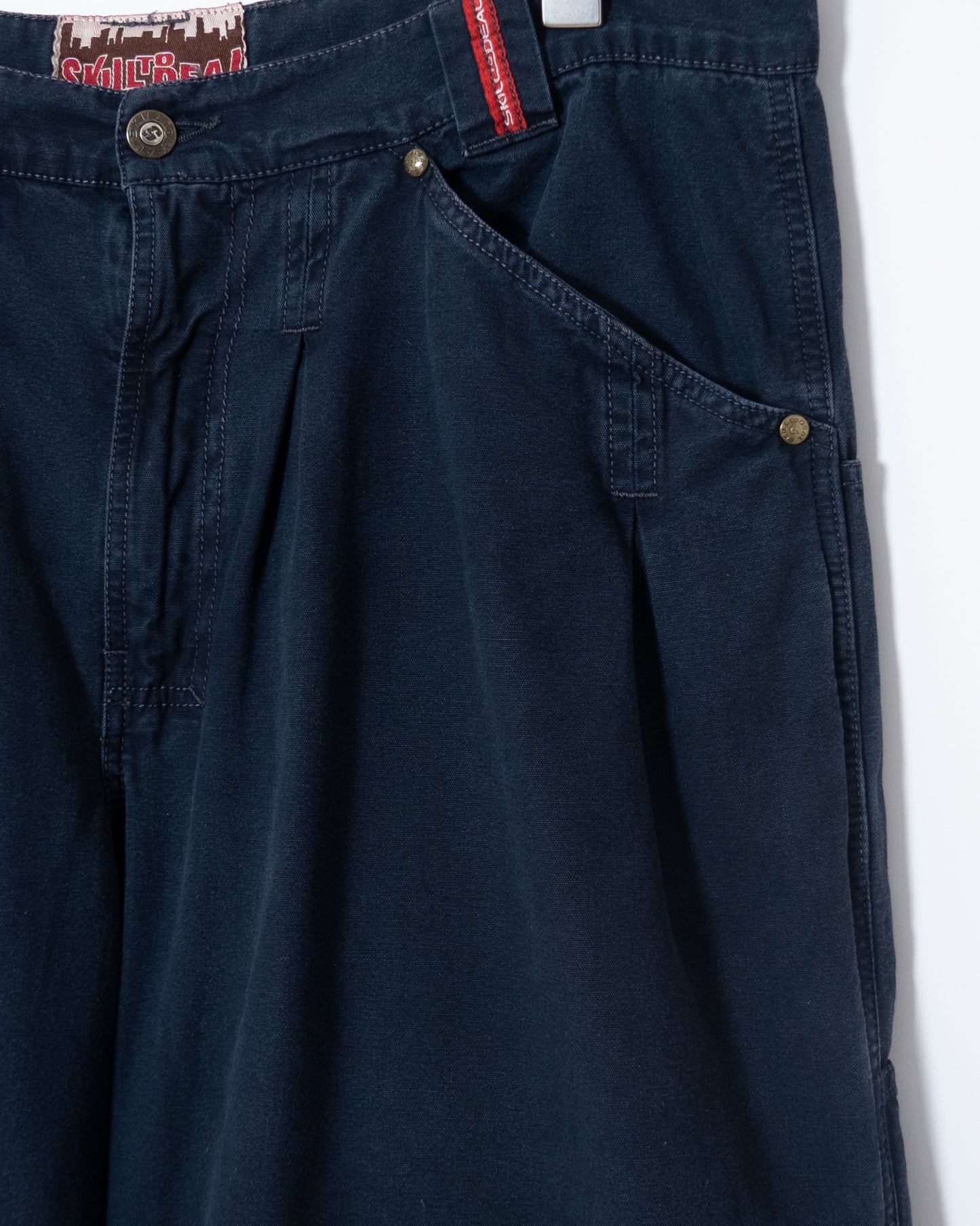 "SKILL TO DEAL" baggy shorts