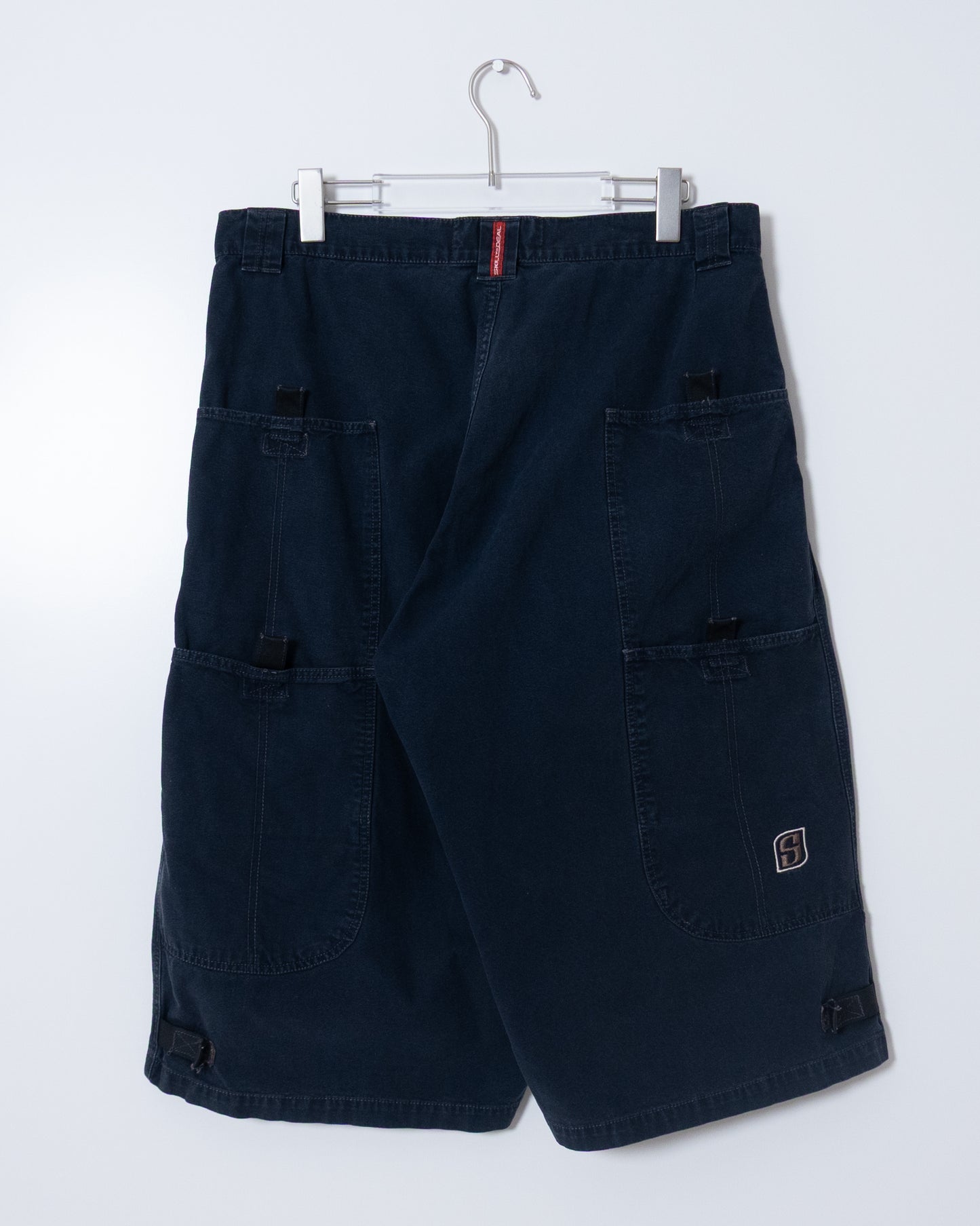 "SKILL TO DEAL" baggy shorts