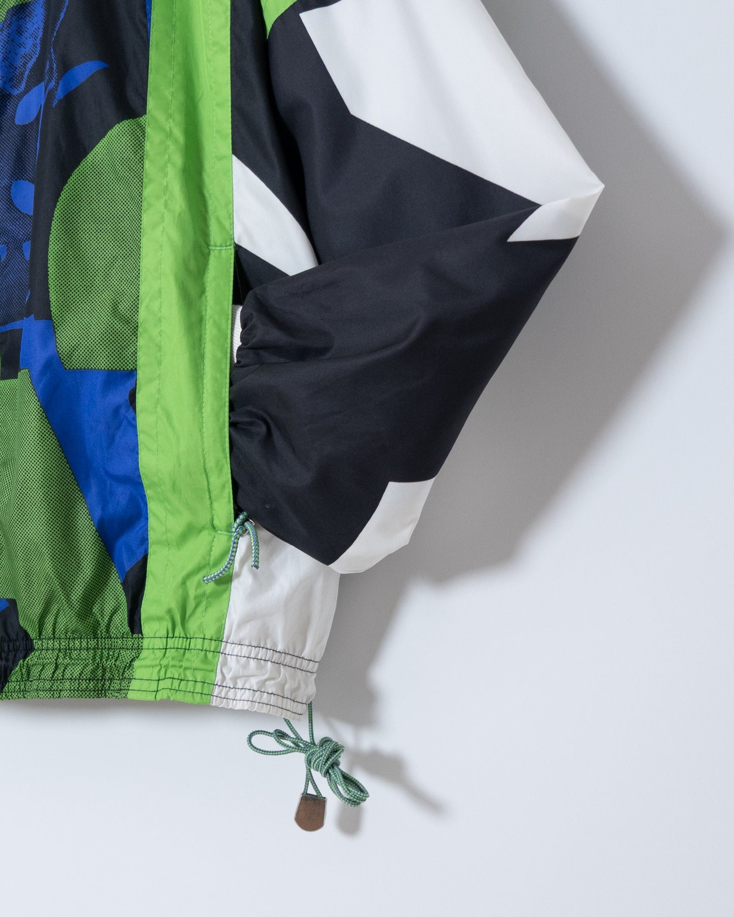 "NIKE" all over pattern nylon hooded jacket